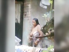 Beautiful Tamil and Sri Lankan Aunty in See-Through Saree